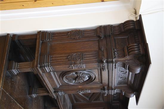 A late 19th century large carved oak breakfront sideboard, W.7ft 9in.